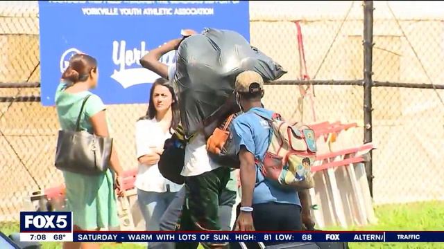 NYC migrant crisis: Floyd Bennett Field to house over 2,500 asylum seekers смотреть онлайн