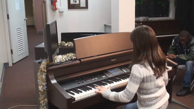 Student performs Bach's Toccata in D Minor смотреть онлайн