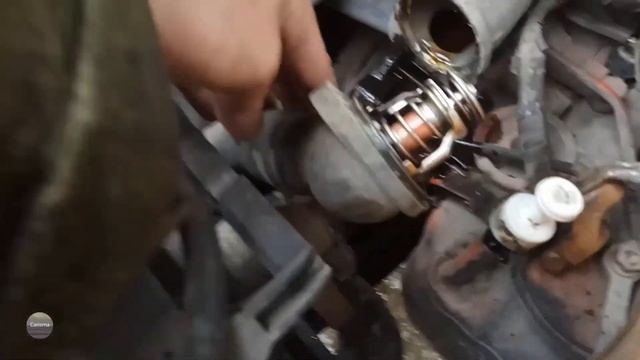 Митсубиси Каризма Замена термостата смотреть онлайн