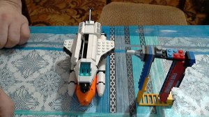 Ракета с шаттлом + гвоздомёт из лего