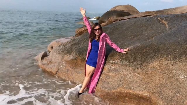 Long coat blue dress high heels and beach.  Part2 