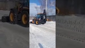 Снегометатель шнекороторный на экскаваторе-погрузчике