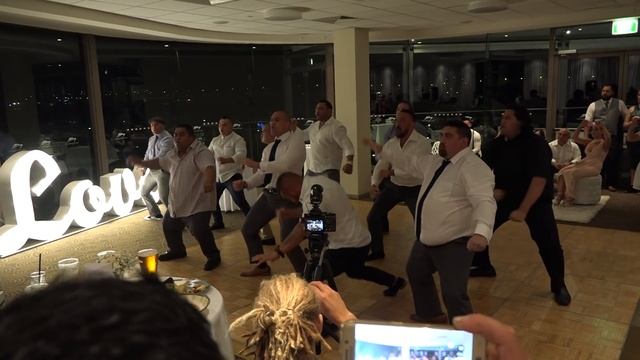 Caleb receiving a Taiaha at Katrina and his wedding reception. смотреть онлайн