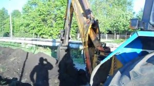 экскаватор мтз 2