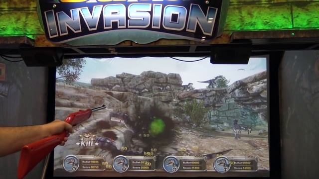Dino Invasion video arcade shooting gallery (UNIS) - IAAPA 2017 смотреть онлайн