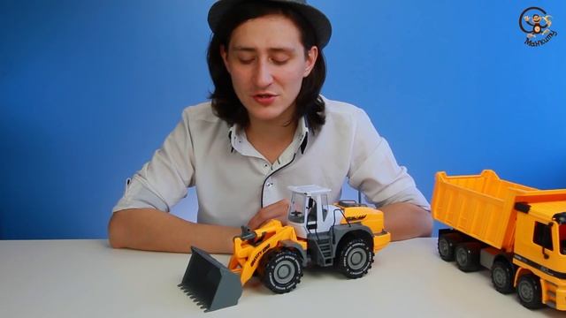 Открываем игрушки машинки. Погрузчик и грузовик самосвал. МанкиИгрушки смотреть онлайн