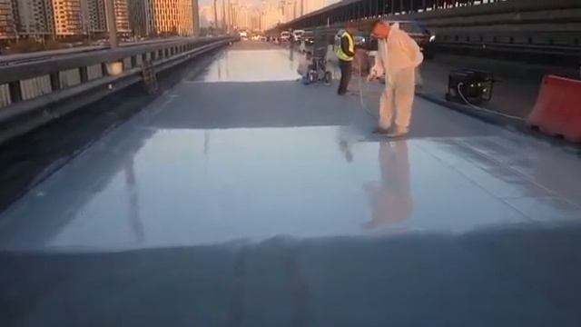 Нанесення гідроізоляції на Південному мосту