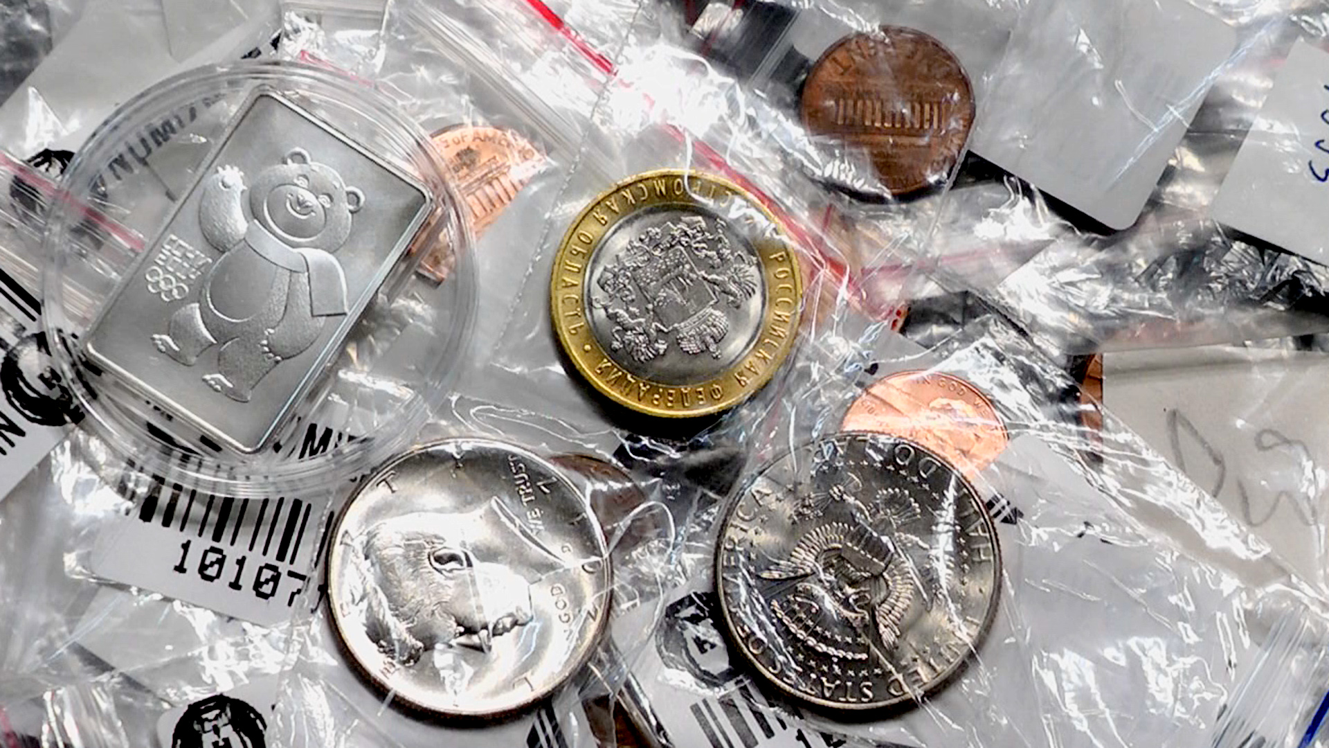 Распаковка посылки с монетами. Серебро Сочи, регулярка США. смотреть онлайн