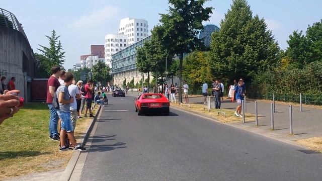 Red Ferrari Dino 308 GT4 leaving Cars and Coffee Düsseldorf смотреть онлайн