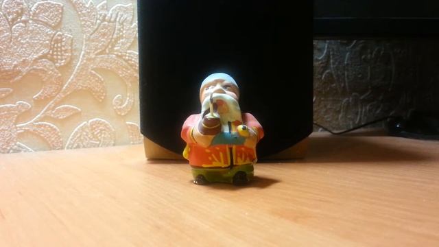 Статуэтка курящего козака