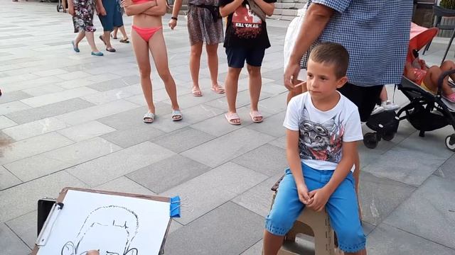 Волшебный художник на набережной нарисовал меня. Похож???? смотреть онлайн