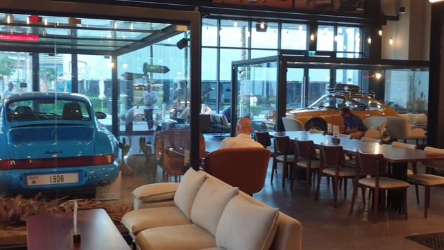 DRVN BY PROSCHE CAFE DUBAI #porsche #cafe #dubai PORSCHE THEMED CAFE @BLUEWATER ISLAND DUBAI смотреть онлайн
