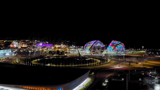 Sochi, Russia. Olympic Park in Sochi. Olympic Flame and Fisht Arena. Night illumination. Sirius Ter смотреть онлайн