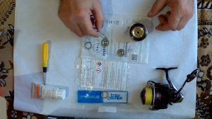 Техническое обслуживание пакета фрикциона спиннинговой безынерционной катушки