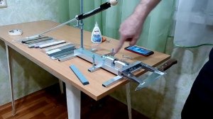 Станок для заточки ножей с поворотным механизмом на двух линейных подшипниках