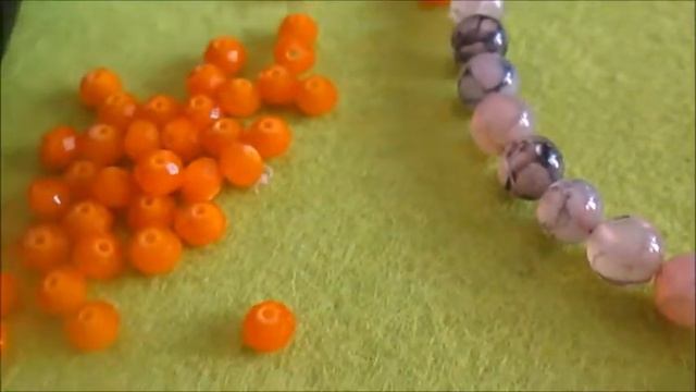 #COLLANA FIOR DI SOLE con fiore ferma tenda e tre giri di perline смотреть онлайн