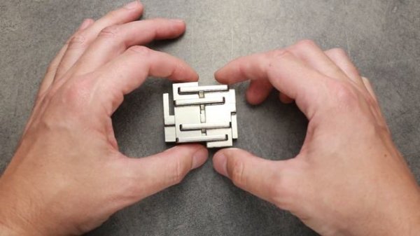 Cast Rattle by Hanayama. Easy solution.