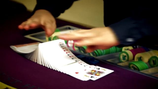 Royalty Free Stock Footage of Preparing cards to shuffle onto casino table смотреть онлайн