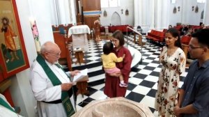 Обряд крещения в Католической церкви г.Владивостока.