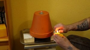 Обогреватель из горшков и нескольких свечек