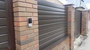 Откатные ворота, зашивка сайдингом.