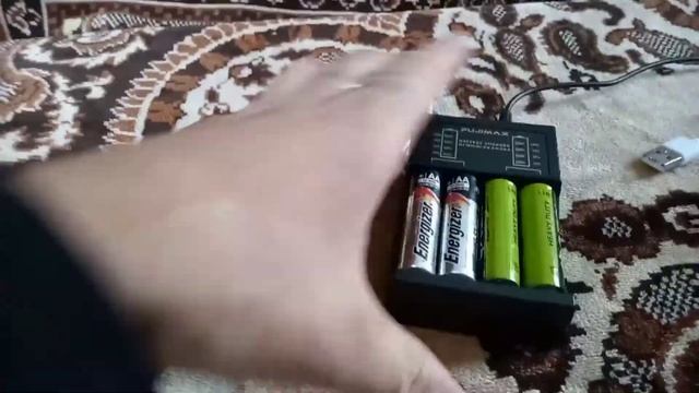 Распаковка китайской посылки (зарядный блок аккумуляторов АА и ААА PUJIMAX) смотреть онлайн