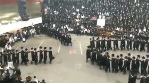 Boys dancing by the Sheva Bruchos of the Rabbi grandchild in New Square