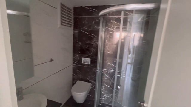 Мерсин.Обзор квартиры 2+1 (стоимостью 107000$) в новом доме в районе Тедже(Турция.Средиземное море) смотреть онлайн