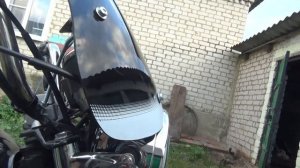 Мопед Альфа установил кофр и обтекатель.