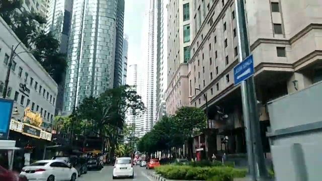 Petronas Twin Towers - A Famous Landmark in Kuala Lumpur - Travel in Malaysia 2019 смотреть онлайн