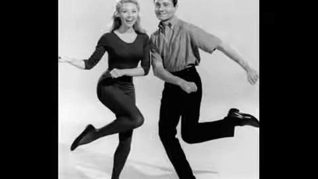 Let's Twist Again - Lyrics - Chubby Checker смотреть онлайн