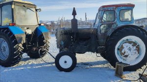 Холодно -25.Тащим замерший Т-40.Сново боремся со снегом.