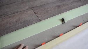 Как стыковать ламинат с плиткой