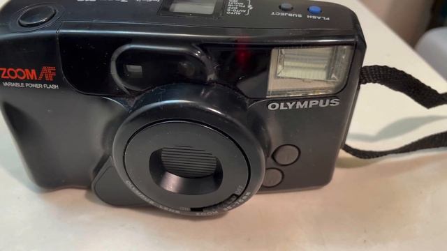 OLYMPUS INFINITY ZOOM 210 QUARTZ DATE 38-76MM AUTO FOCUS ZOOM FILM CAMERA смотреть онлайн