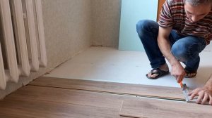 Переход ламината из комнаты в коридор без порога