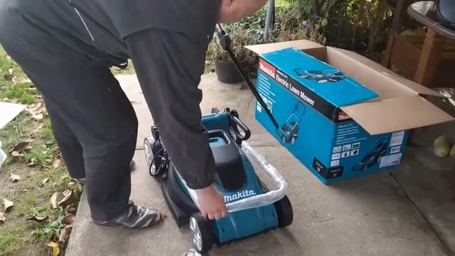 Распаковка - Газонокосилка электрическая Makita ELM4120 смотреть онлайн