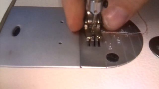 Регулировка лапки на промышленной прямострочке