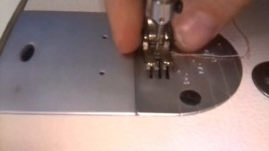 Регулировка лапки на промышленной прямострочке