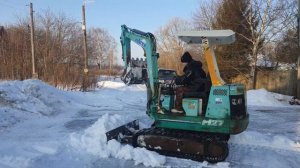 уборка снега мини экскаватор