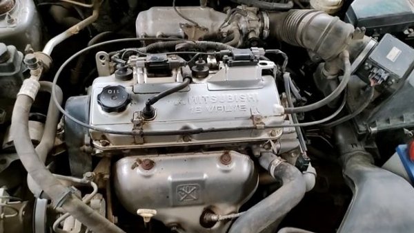 Обзор и осмотр  Mitsubishi Carisma часть 2. Честный отзыв по каризме.