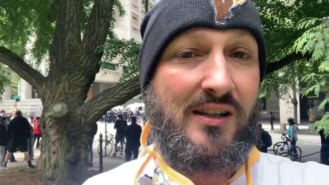 Raw Video_ Portland Police Officers Kneel With Protesters