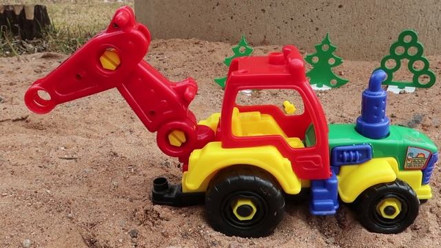 Трактор - игрушка для детей. Собираем трактор погрузчик. Машины для детей смотреть онлайн