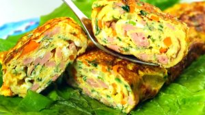 ЯИЧНЫЙ РУЛЕТ С КОЛБАСОЙ,СЫРОМ,ПОМИДОРАМИ И ЗЕЛЕНЬЮ.