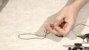 Как надёжно привязать леску к шпуле катушки.