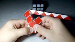 КАК СДЕЛАТЬ ПОДСТАВКУ ДЛЯ КУБИКА РУБИКА ИЗ ЗМЕЙКИ