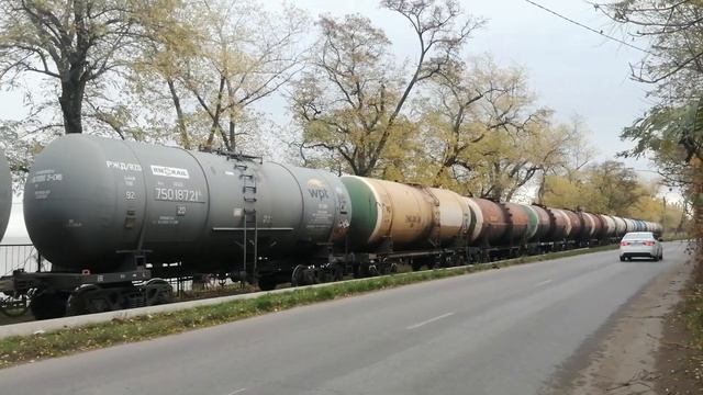 Тепловоз ТЭМ18ДМ 1891 с грузовым поездом. смотреть онлайн