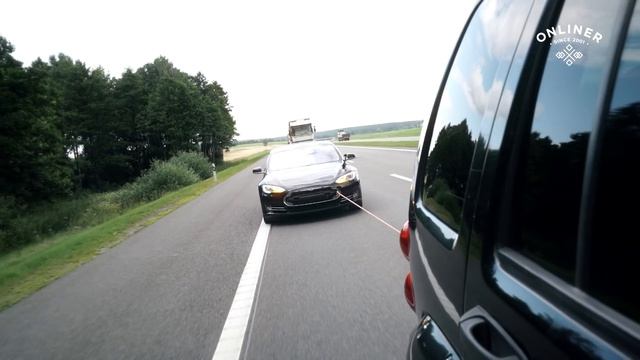 Зарядка Tesla Model S с помощью буксировки и генератора смотреть онлайн