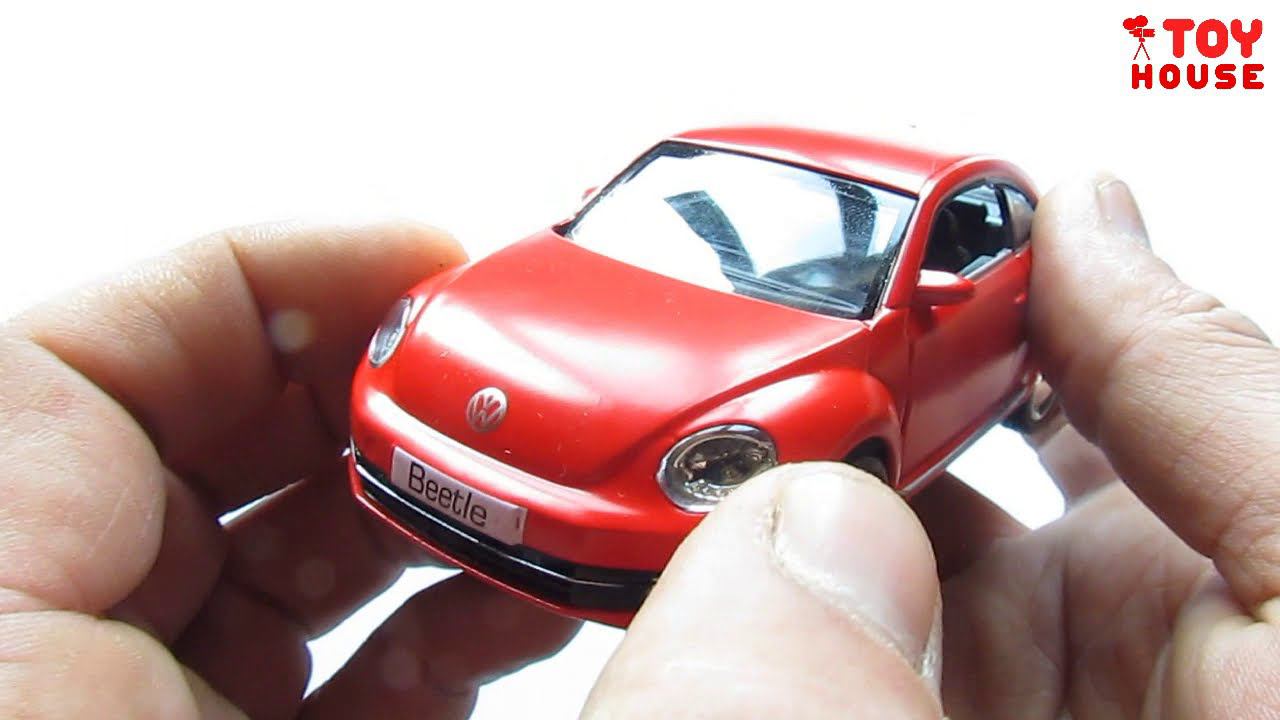 Открываю машинку модельку Volkswagen Beetle Жук распаковка и обзор. Про машинки. смотреть онлайн
