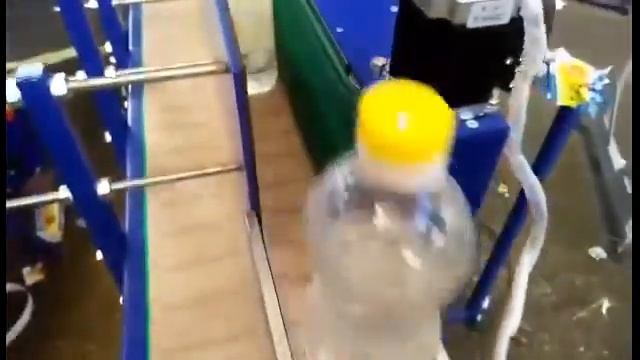 Автоматический этикетировщик круглой тары ECP-1(М) смотреть онлайн