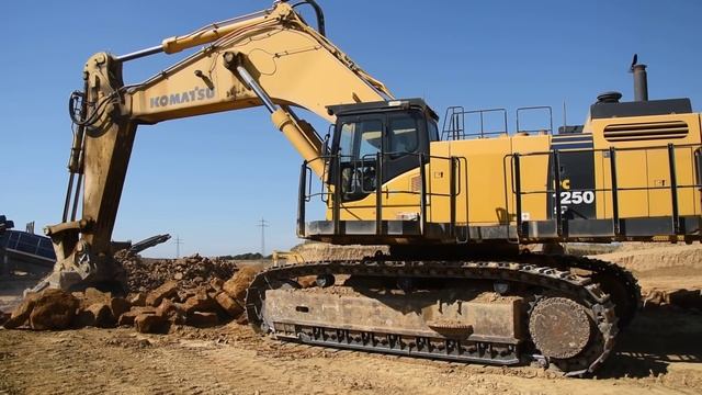 Komatsu PC1250 loading HM400 смотреть онлайн
